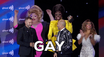 Celebrity gif. Drag queens are presenting at the GLAAD Awards and they all begin to chat, "Gay, gay, gay, gay," and the audience joins in with them.