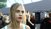 frustrated cara delevingne GIF
