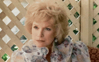 interesting shirley maclaine GIF