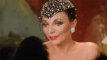 joan collins march GIF