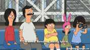 Tina Belcher from Bob's Burgers performing an exaggerated twerk, her arms flailing and her face contorted in a mix of determination and joy.