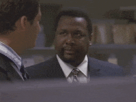 TV gif. Wendell Pierce as Bunk from The Wire staring at a man and shaking his head in disbelief as he walks away.