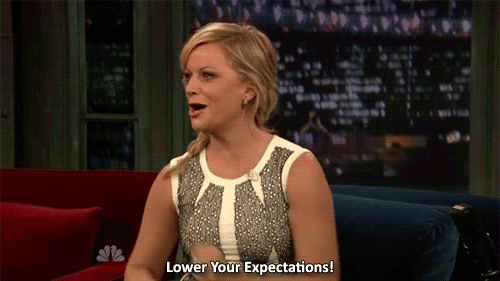 amy poehler dancing with her arms and saying lower your expectations