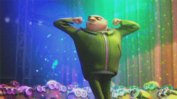 Movie gif. Disco lights shine across onlooking Minions from Despicable Me as a serious Gru flaps his elbows for some unusual dance moves.