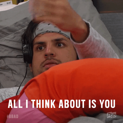 Reality TV gif. Faysal Shafaat on Big Brother After Dark lays in bed with headphones on and gestures toward someone as he raises his eyebrows and says, "All I think about is you."