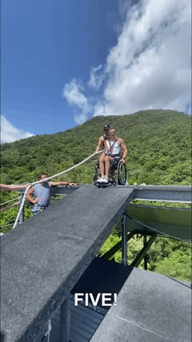Bungee Jump Wheelchair GIF by Storyful