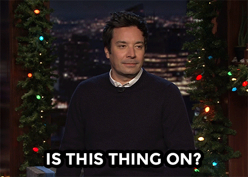 GIF of Jimmy Fallon saying "is this thing on?".