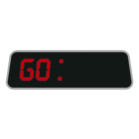 Digital art gif. A black and red digital clock flashes on a white background. The clock reads, "Go Time"