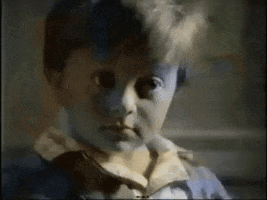 Video gif. Young boy rolls his eyes very loudly and spreads his mouth into a tight line like he’s over it all.