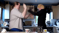 slap fight gif seinfeld