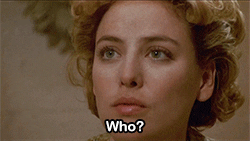 Movie gif. Virginia Madsen as Helen in Candyman in a close up looks at someone, blinking blankly, saying, "Who?"