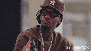 Celebrity gif. Rapper Offset gives a serious point of the finger towards someone talking to agree hard with what they're saying. 