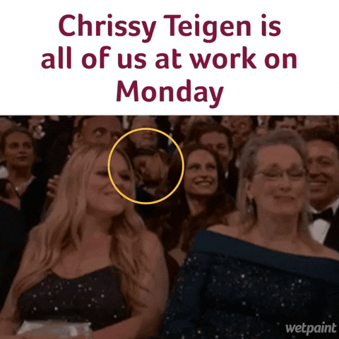 Text gif. Chrissy Teigen takes a nap, going undetected in a big crowd of celebrities all engaged in laughing and clapping at the Oscars ceremony. Text, "Chrissy Teigen is all of us at work on Monday."