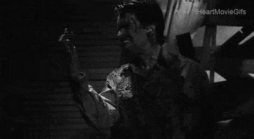 iheartmoviegifs devil facepalm ash evil dead GIF