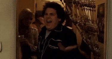 Movie gif. A frustrated and confused Jonah Hill as Seth in Superbad throws up a hand and says, “I know, right?”