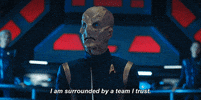 TV gif. Doug Jones, as Commander Saru in Star Trek says solemnly, “I am surrounded by a team I trust.