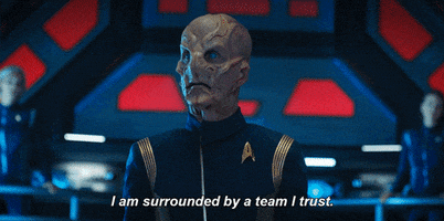 TV gif. Doug Jones, as Commander Saru in Star Trek says solemnly, “I am surrounded by a team I trust.