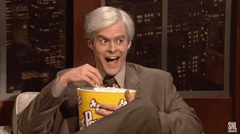 SNL gif. From the sketch "Dateline: The Mystery of the Chopped Up Guy", Bill Hader as Keith Morrison eats popcorn with a creepy, enthusiastic grin.
