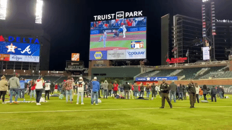 X-এ Baseball GIFs: A Braves fan at Nationals Park shows off