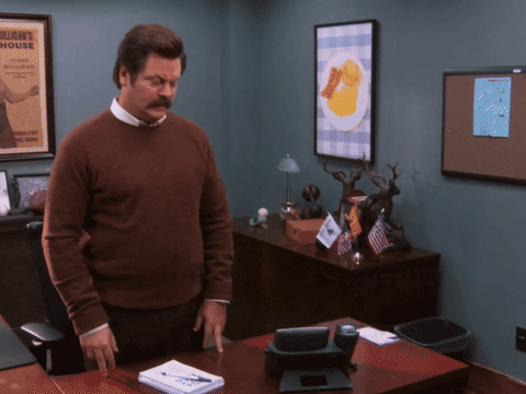 Parks and Recreation gif. Nick Offerman as Ron stares intensely at the floor before looking right at us with a confused expression and saying, "What the hell just happened?" which appears as text.