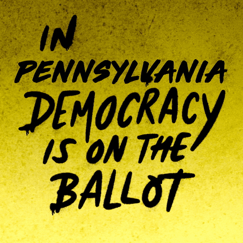 Text gif. Handwritten capitalized text against bright yellow background reads, “In Pennsylvania democracy is on the ballot.” A hand holding a can of blue spray paint underlines the word, “Pennsylvania.”
