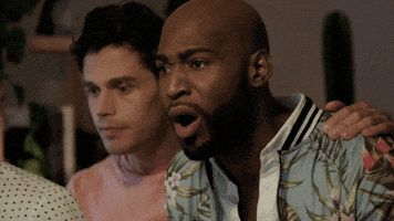 Reality TV gif. With a jaw drop, Warren from Queer Eye looks shocked, while Antoni appears concerned, with his hand on Warren's shoulder.