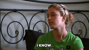 Reality TV gif. Heidi Montag in The Hills, seated on a bed, looks down at her lap as she says, "I know," which appears as text. 