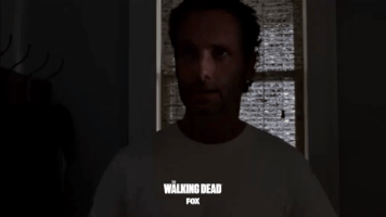 staring the walking dead GIF