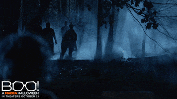 Ad gif. Tyler Perry as Madea in Boo! A Madea Halloween, and another woman, are in the dark woods at night. A large crowd of zombies swarms into the forest after them. The other woman screams, "Madea!" Madea pops out from behind something frowning and says, "The hell wrong with you?"