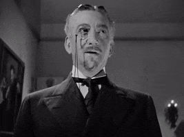 Movie gif. We look up at John Litel as Dr. Flegg in The Return of Dr. X as he wears a monocle and sternly says, "Go back to your work." 