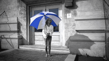 christucker-0af6 black and white cinema graph umbrella.twirl girl.women GIF