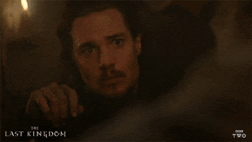 TV gif. Alexander Dreymon as Uhtred on The Last Kingdom rolls his eyes and looks away from someone with disappointment and boredom.