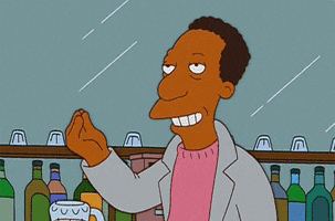 The Simpsons gif. Carl Carlson stands at a bar. He holds his fingers to his mouth and kisses them, like a chef’s kiss.