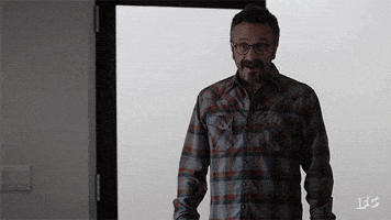 marc maron shrug GIF by IFC