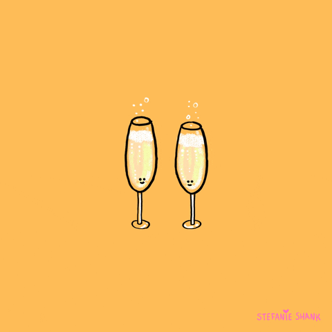 Illustrated gif. Against a yellow background, two champagne flutes with tiny smiley faces on them leap up and clink together.
