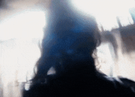 Music video gif. From the video for Lose My Cool, Amber Mark hurries toward a closed subway door, slaps the side of the door and then turns around, frustrated.
