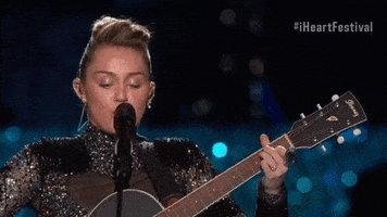 Miley Cyrus Singing GIF by iHeartRadio