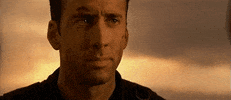 Movie gif. Nicolas Cage as Goodspeed in The Rock nods seriously and straight-faced while saying "yeah," which appears as text.