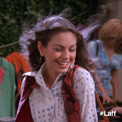 mila kunis laughing GIF by Laff