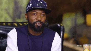 TV gif. In a baseball cap, Desus from Desus and Mero shakes his head and says, “No.” He then motions his hand as if to say, “Stop.”