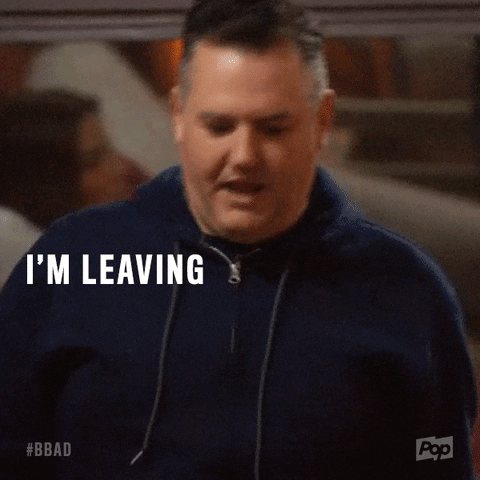 Reality TV gif. A man on Big Brother: After Dark looks down as he walks toward us and says, "I'm leaving. Goodbye."