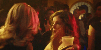 Movie gif. Anna Kendrick as Martha in Mr. Right. She's spazz dancing on the floor at a house party and she looks excited and cute.