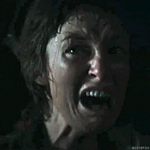 Movie gif. Sigourney Weaver as Ellen Ripley in Alien is sweaty and she looks up with an open mouth with pure terror.