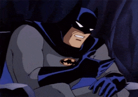 Cartoon gif. Batman leans over and does a facepalm.