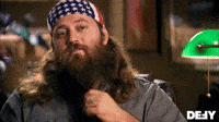 Reality TV gif. Willie Robertson on Duck Dynasty smugly tilts his head up, lifting his eyebrows, and says, “I’m looking forward to it.”