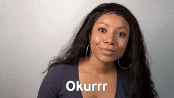 Celebrity gif. Shalita Grant tilts her head as she looks at us and points her finger with a flick. Text, "Okurr."