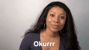 Celebrity gif. Shalita Grant tilts her head as she looks at us and points her finger with a flick. Text, "Okurr."