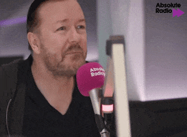 Ricky Gervais Laughing GIF by AbsoluteRadio