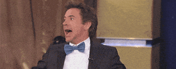 excited robert downey jr GIF