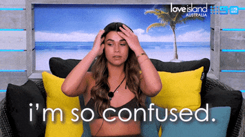 Reality TV gif. A contestant in Love Island is being interviewed and she adjusts her hair while looking around. She puts her hands out and announces, "I am so confused."